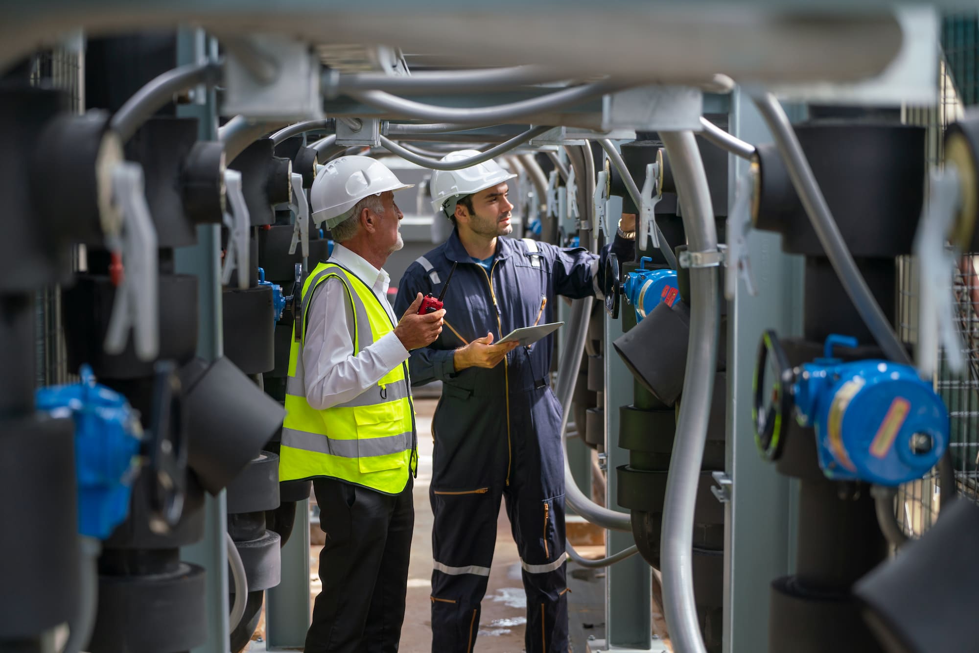 engineers working on a water pump